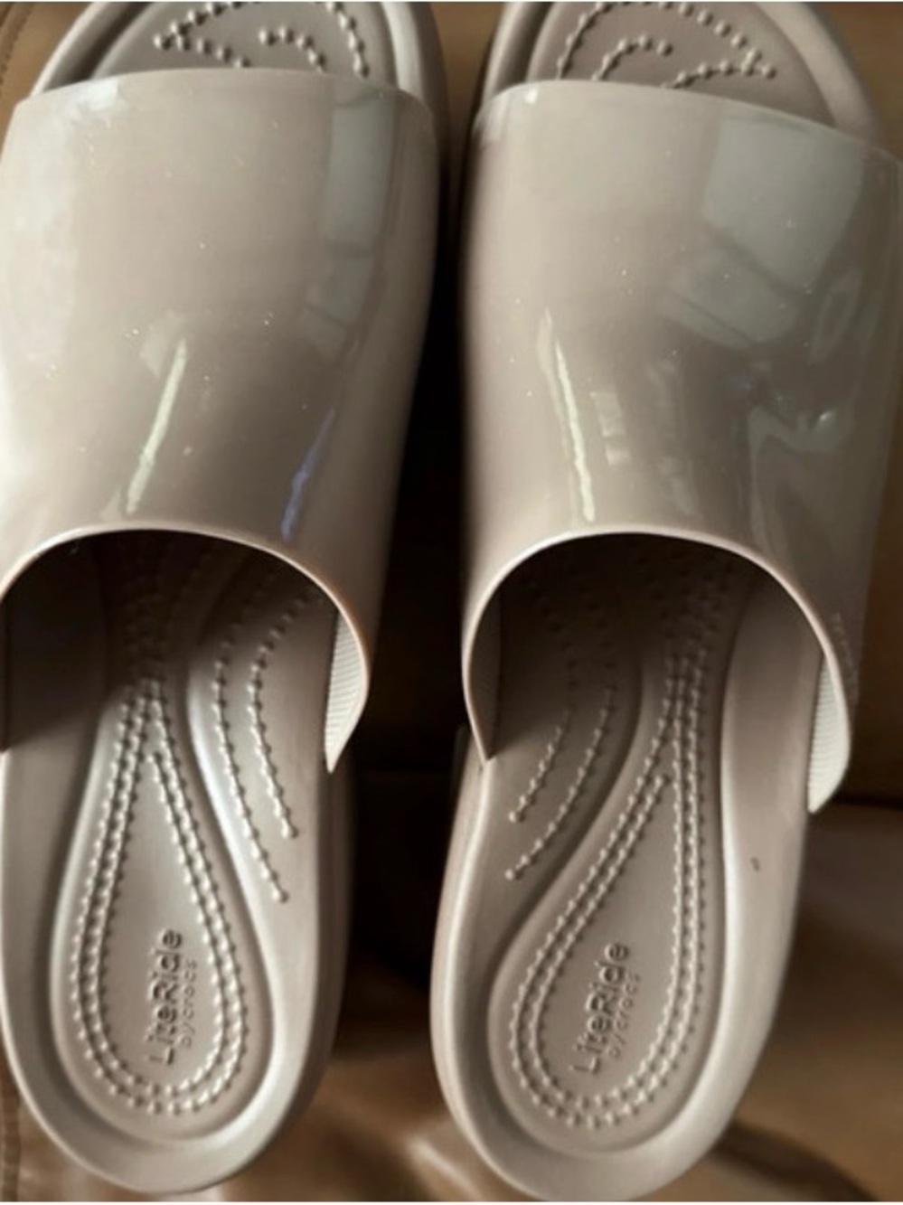 CROCS Women's Glossy Slide Mules in Light Beige